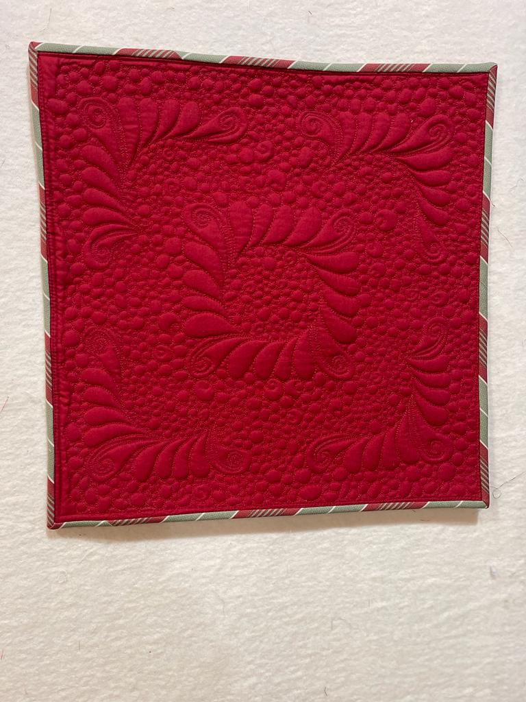 Red with Feather Wreath pillow – colorful textile design