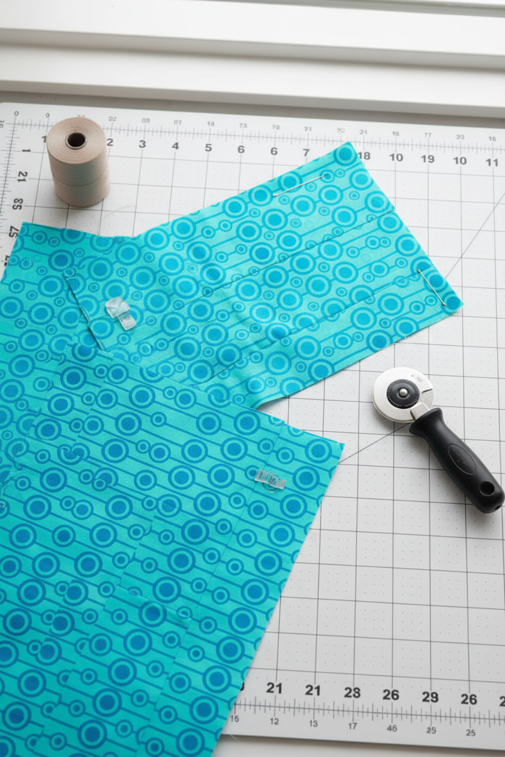 Vertical view of PAWsitivity Blue Circles quilting cotton - cheerful geometric pattern ideal for fun quilts and playful projects