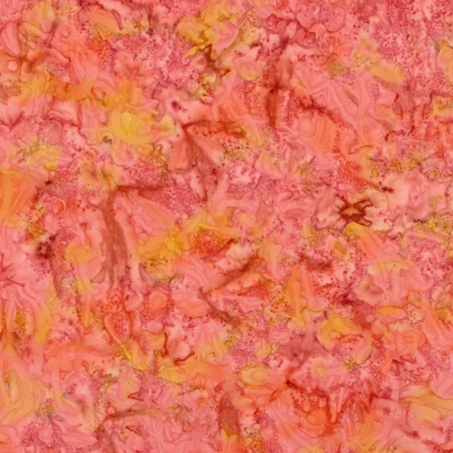 Close-up detail of Expressions Batiks Hand-Dyes Sunset quilting cotton fabric highlighting print clarity and warm multicolor hand-dyed batik texture with coral pink, golden yellow, and peach