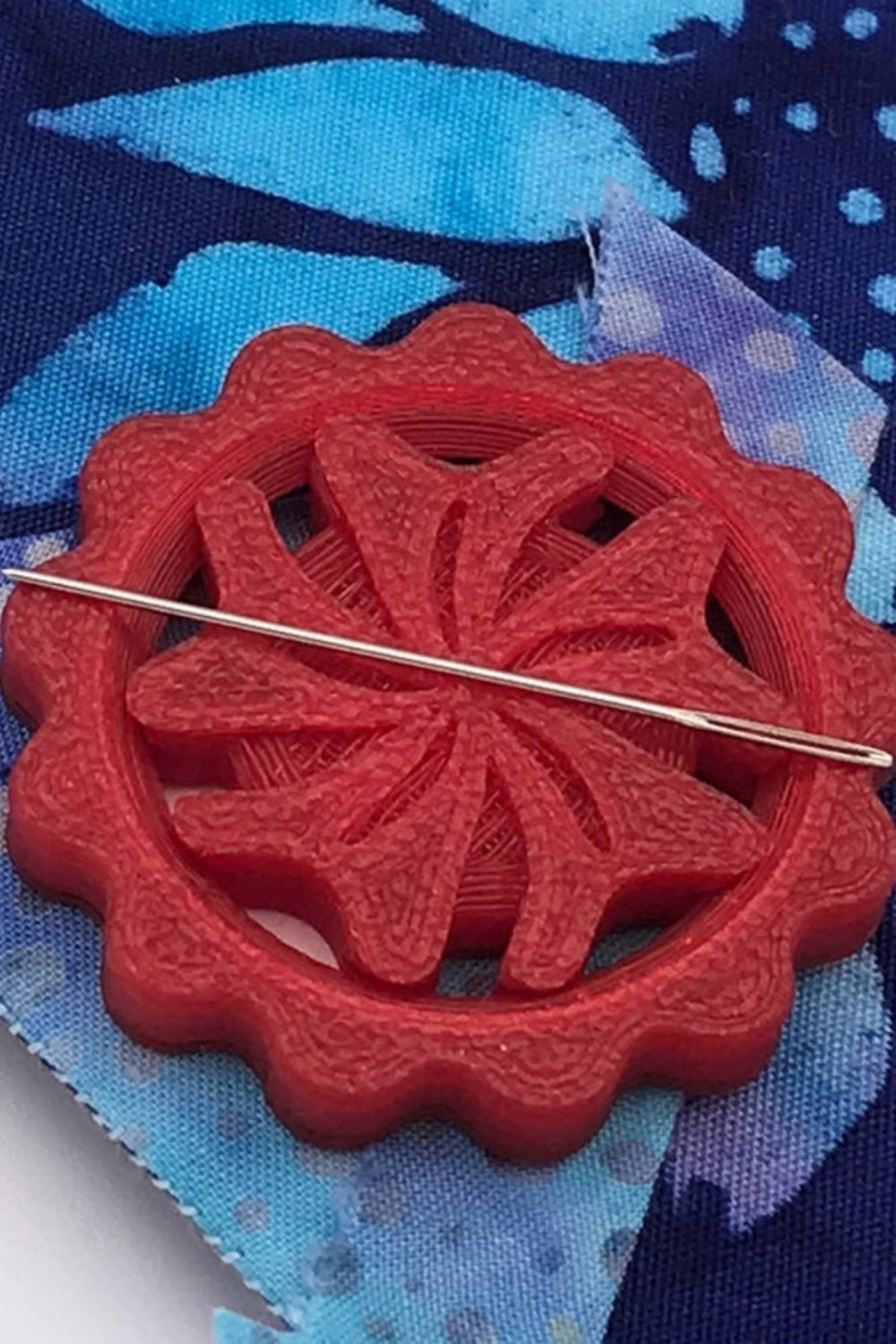 Close-up ruby magnetic needle holder for quilting and hand sewing projects by Purple Hobbies LLC