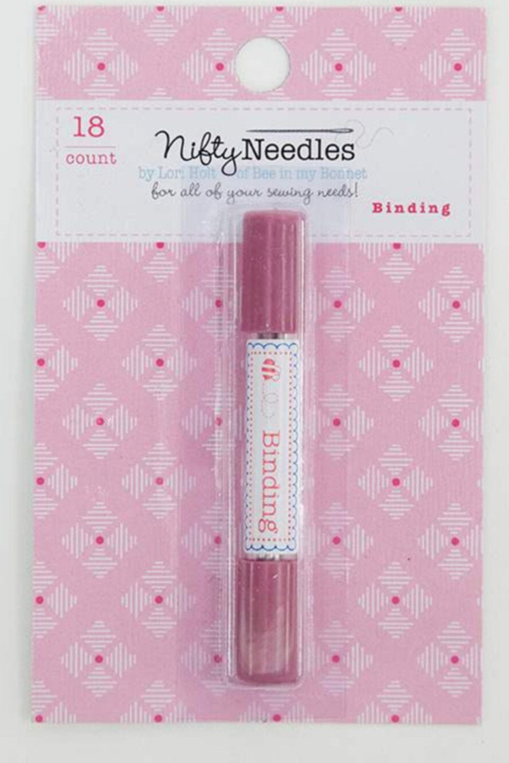 Lori Holt Nifty Needles Binding Tube with pink caps, 18 color-coded hand sewing needles in retail packaging