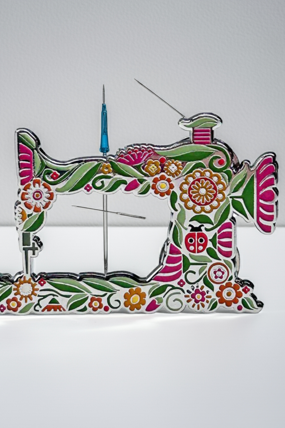 Floral sewing machine needle minder holding pins