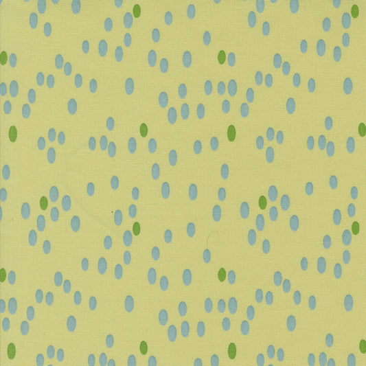 Olive You Dots Light Lime Fabric by Zen Chic for Moda Fabrics, close-up of aqua oval dots and green accents on a light lime background.