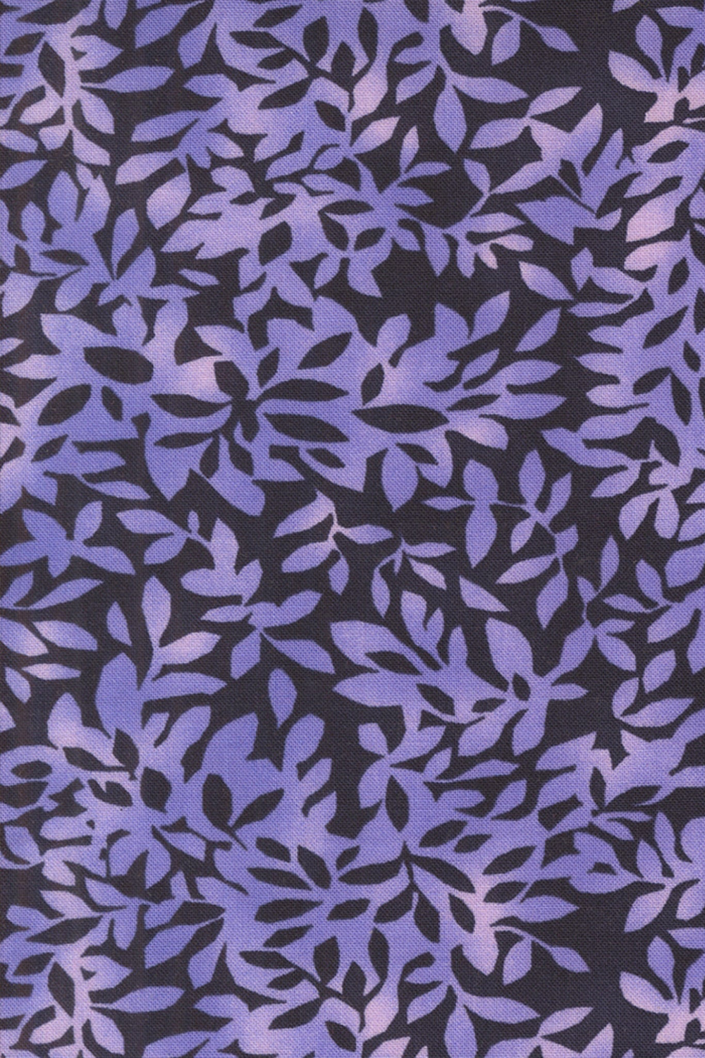 Superbloom Leafy Indigo fabric by Robin Pickens for Moda Fabrics, featuring overlapping lavender-purple leafy branches on a dark indigo ground.