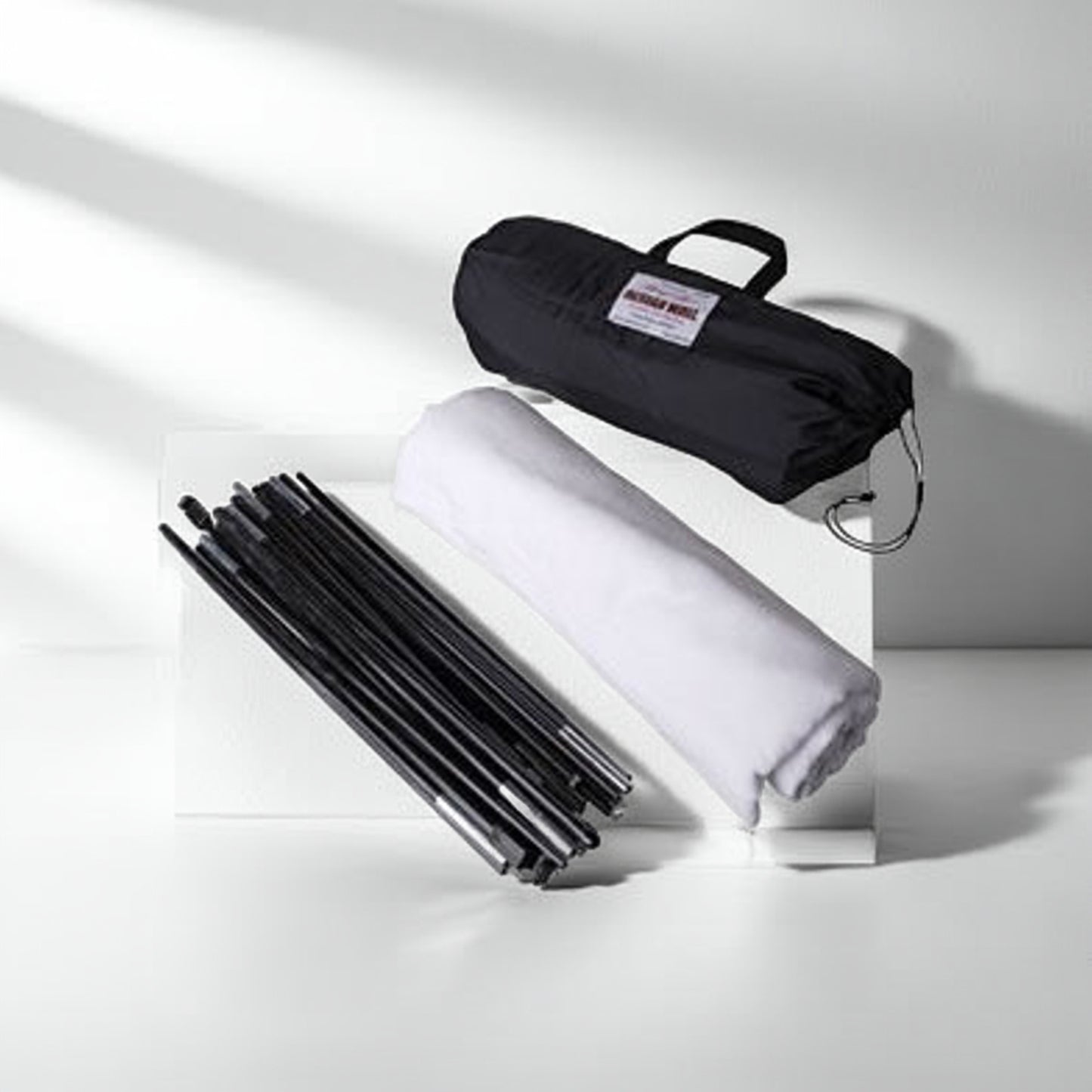 Portable quilt design wall disassembled with poles and carry bag