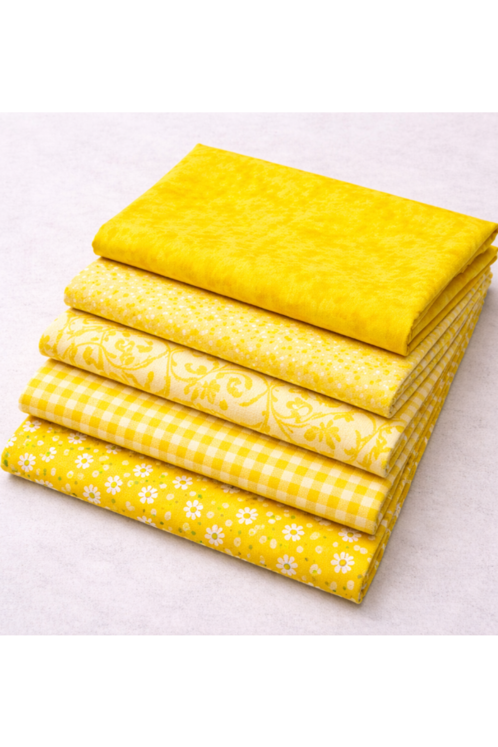 Expressions Batiks Hand-Dyed Bumblebee – Pinterest coordination stack with 5 complementary fabrics slightly fanned on light grey background