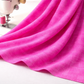 Interwoven Pink quilting cotton draped in sewing room showing vibrant geometric pattern ready for quilting