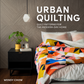 Urban Quilting book cover by Wendy Chow — bold multicolor geometric pinwheel quilt on bed in modern bedroom with black nightstand, potted plant, and geometric pendant light — Quilt Patterns for the Modern-Day Home published by Paige Tate & Co.