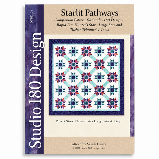 Starlit Pathways quilt pattern DTDD104 by Sarah Furrer for Studio 180 Design — Hunter's Star variation in teal, purple, and red batiks, available in throw, extra long twin, and king sizes — requires Rapid Fire Hunter's Star Large Star and Tucker Trimmer I tools
