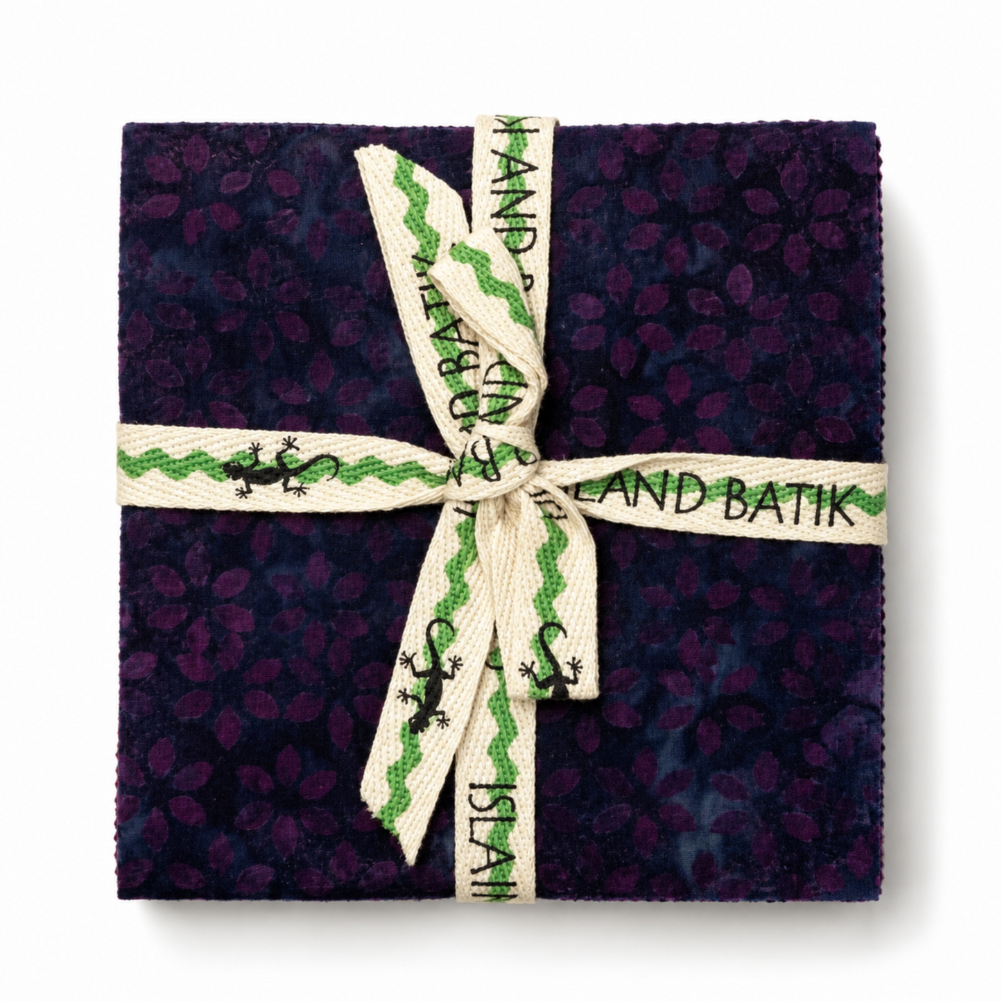 Island Batik Savannah Batiks Charm Pack – 42 precut 5" squares in deep purple and navy hand-dyed batik cotton, tied with Island Batik ribbon