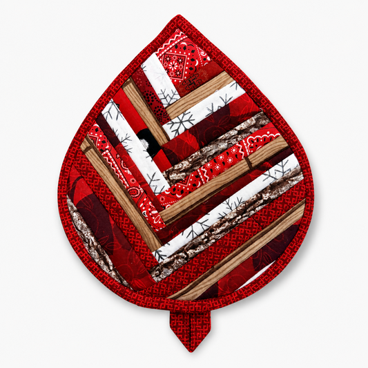 Leaf-Shaped Quilted Hot Pad – Christmas Red, front view showing patchwork strips of holiday fabrics including snowflakes, wood grain, and red prints – handmade by IraRobi Quilts
