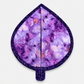 Leaf-Shaped Quilted Hot Pad – Violet Jewel, back view showing purple watercolor batik fabric with deep navy dot-swirl border binding – handmade by IraRobi Quilts