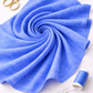 Interwoven Periwinkle quilting cotton lifestyle photo showing draped fabric on cutting table with scissors and other notions