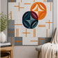 Rings Revival quilt pattern — curved circle blocks in orange, teal, and burgundy on white and grey with orange accent strips