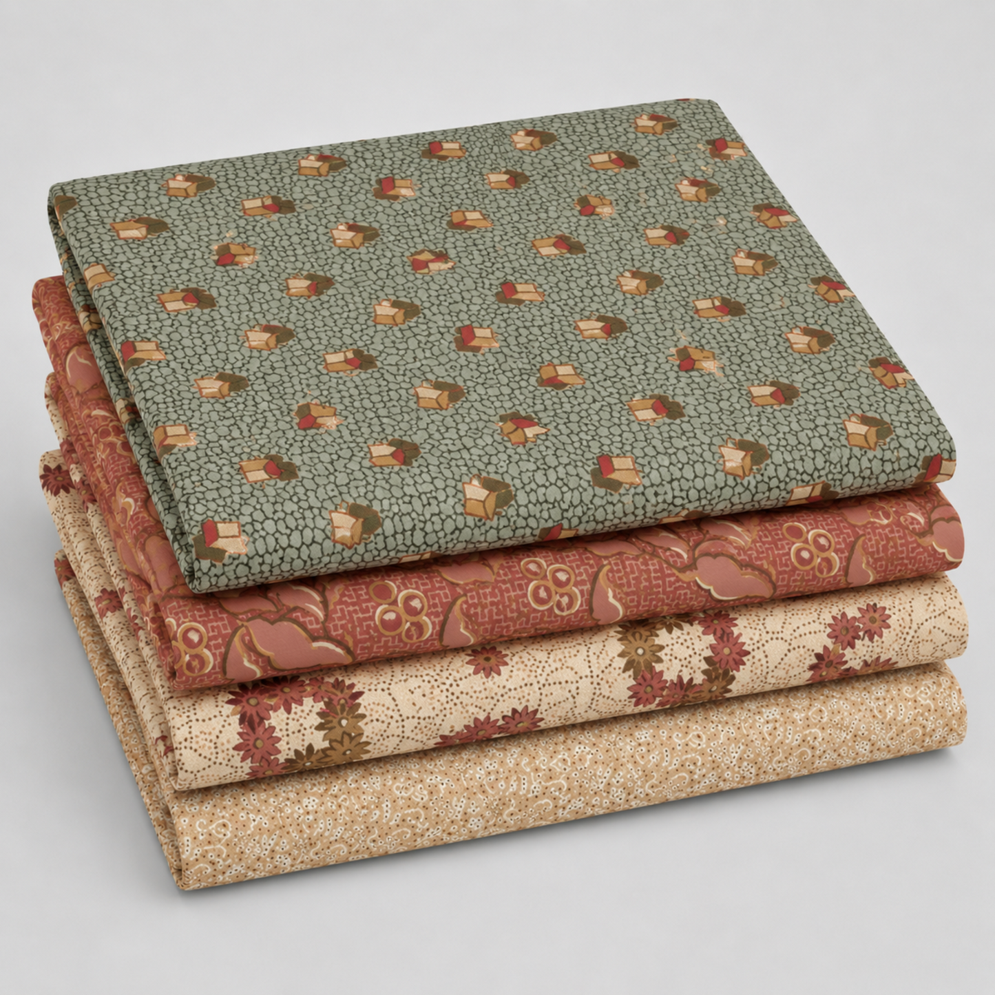 Coordinating quilting cottons from The Fox Homestead collection by Stacy West for Henry Glass — stacked folds of slate blue-green tumbling cubes, dusty rose leaf-and-berry sprigs, cream daisy clusters, and cream paisley swirl, 100% cotton 43–44" wide