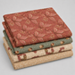 oordinating quilting cottons from The Fox Homestead collection by Stacy West for Henry Glass — stacked folds of dusty rose leaf-and-berry sprigs, slate blue-green tumbling cubes, cream daisy clusters, and cream paisley swirl, 100% cotton 43–44" wide