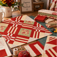 Interwoven Tomato Fabric by Jason Yenter for In The Beginning Fabrics featured as lattice strips, sashing, and square-in-square blocks in an Echo Effects quilt in progress on a sewing table — blocks laid out on a cutting mat alongside folded fabric stacks, rotary cutter, scissors, thread, and a "Good Fabric Good Mood" mug. Quilts shown for inspiration feature the Echo Effects Quilt Pattern — available at IraRobi Quilts.