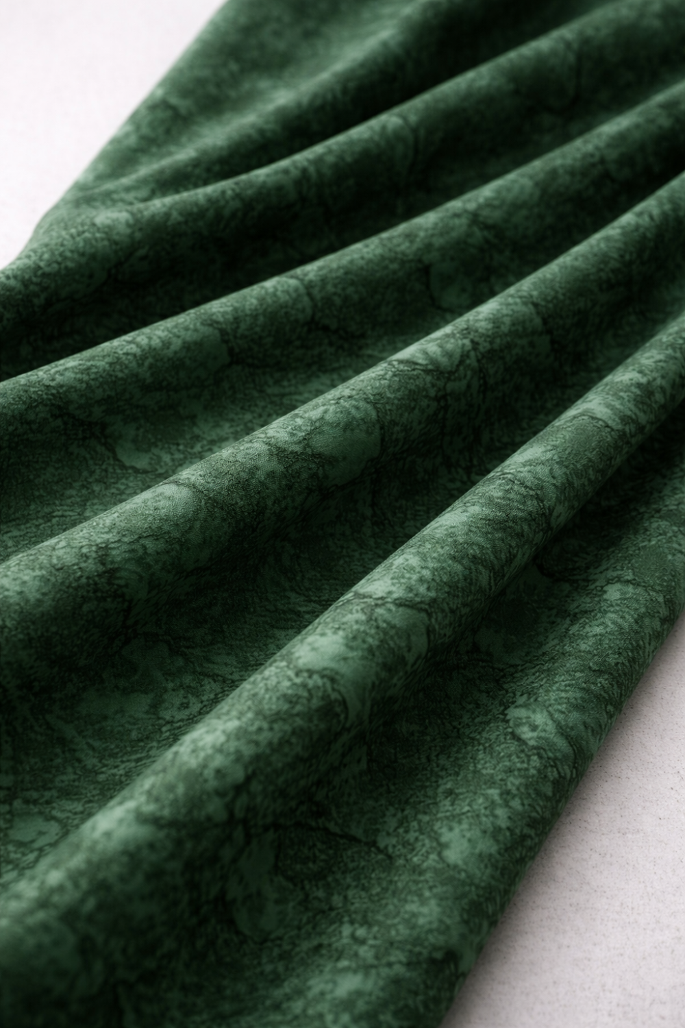 Expressions Batiks Hand-Dyed Evergreen Bolt B quilting cotton fabric by Riley Blake Designs – rich evergreen hand-dyed batik in soft folds showing drape and tonal texture on light grey background