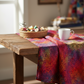 Impressions Red Dots quilting cotton styled on cutting mat with quilting tools – lifestyle shot for quilters