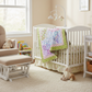 Nursery room with a crib, rocking chair, and toys.