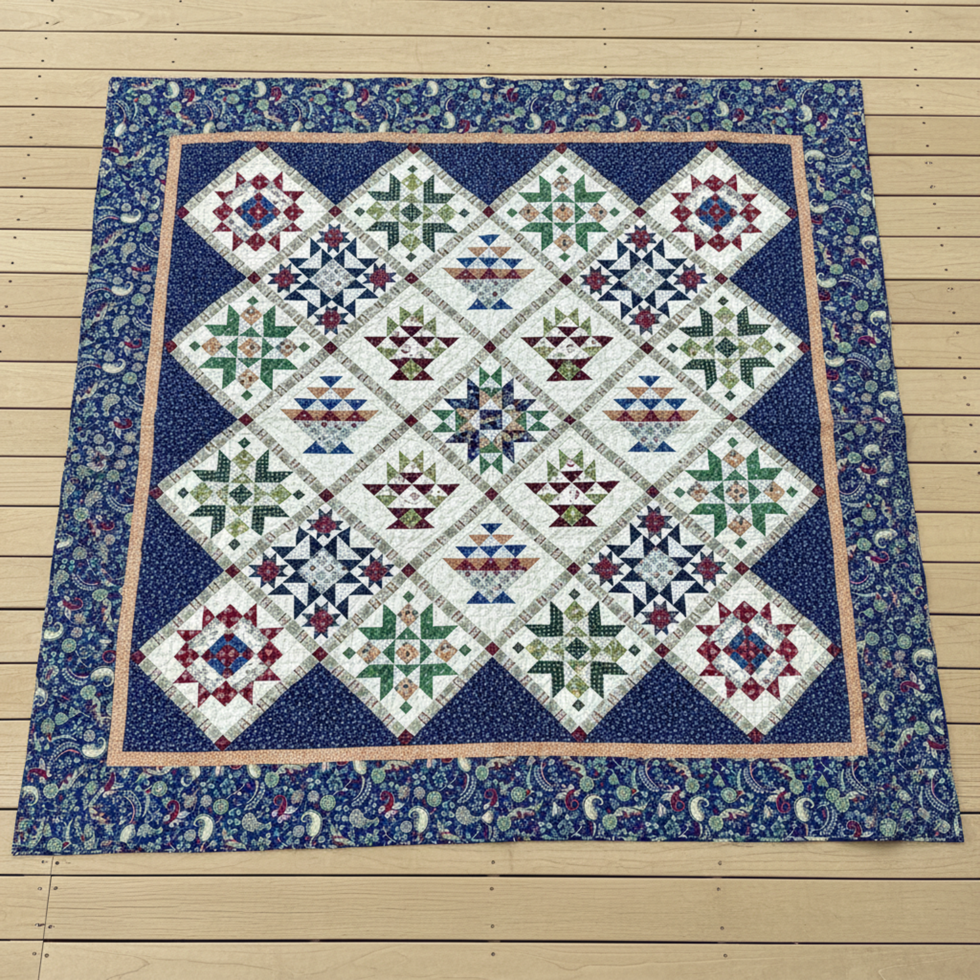 Vintage Sampler handmade queen quilt with basket and star blocks laid flat