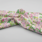 Decoupage Lilac Pink fabric draped to show natural movement and soft hand of 100% cotton quilting fabric