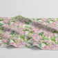 Decoupage Lilac Pink 3 yard cut quilting fabric shown from alternate angle highlighting layered pink and green florals
