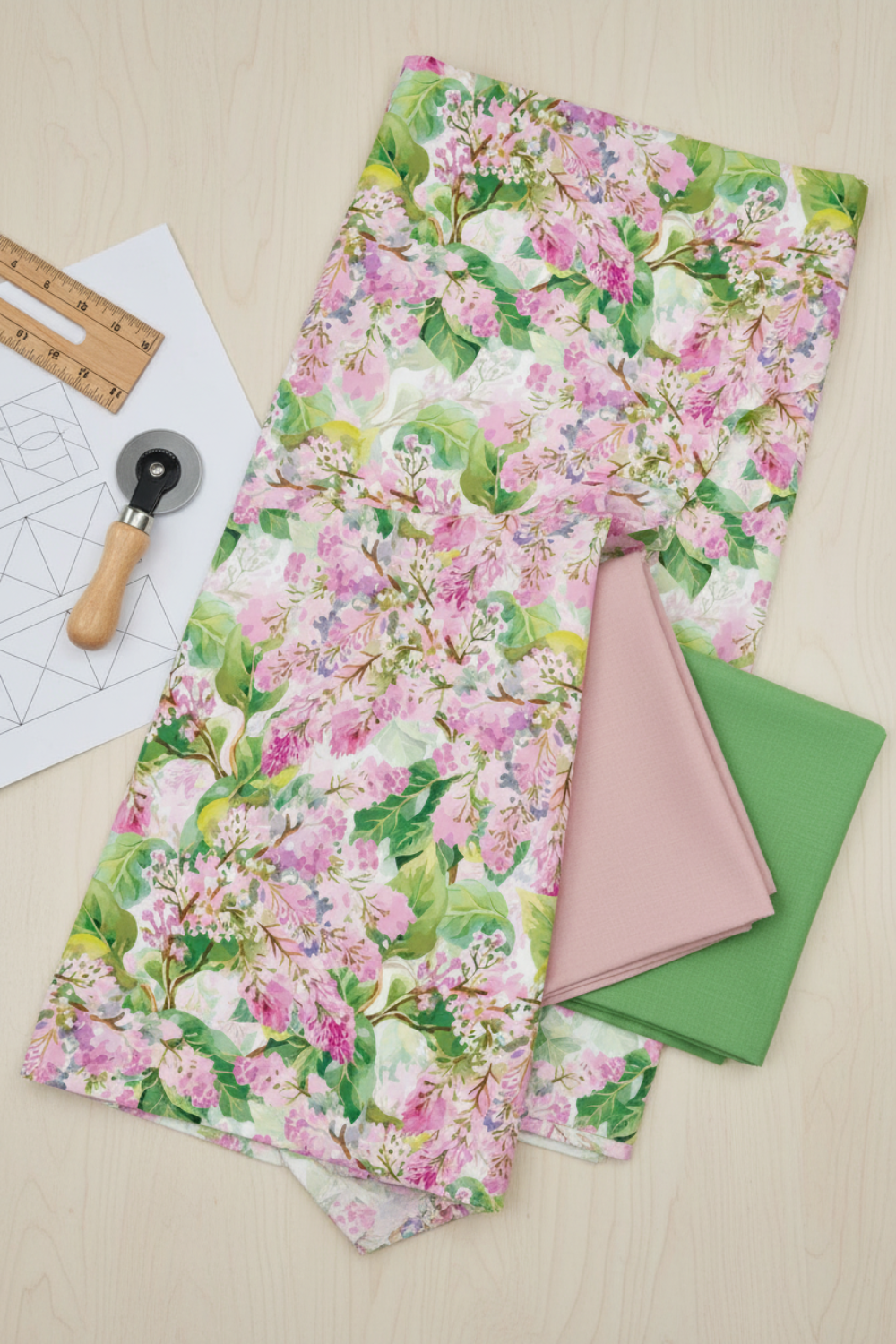 Decoupage Lilac Pink quilting cotton styled with coordinating fabrics for quilt color planning and project inspiration