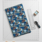 Whimsy Anemones and Berry Pods Blue quilting cotton styled on cutting mat with ruler and rotary cutter – quilt planning lifestyle