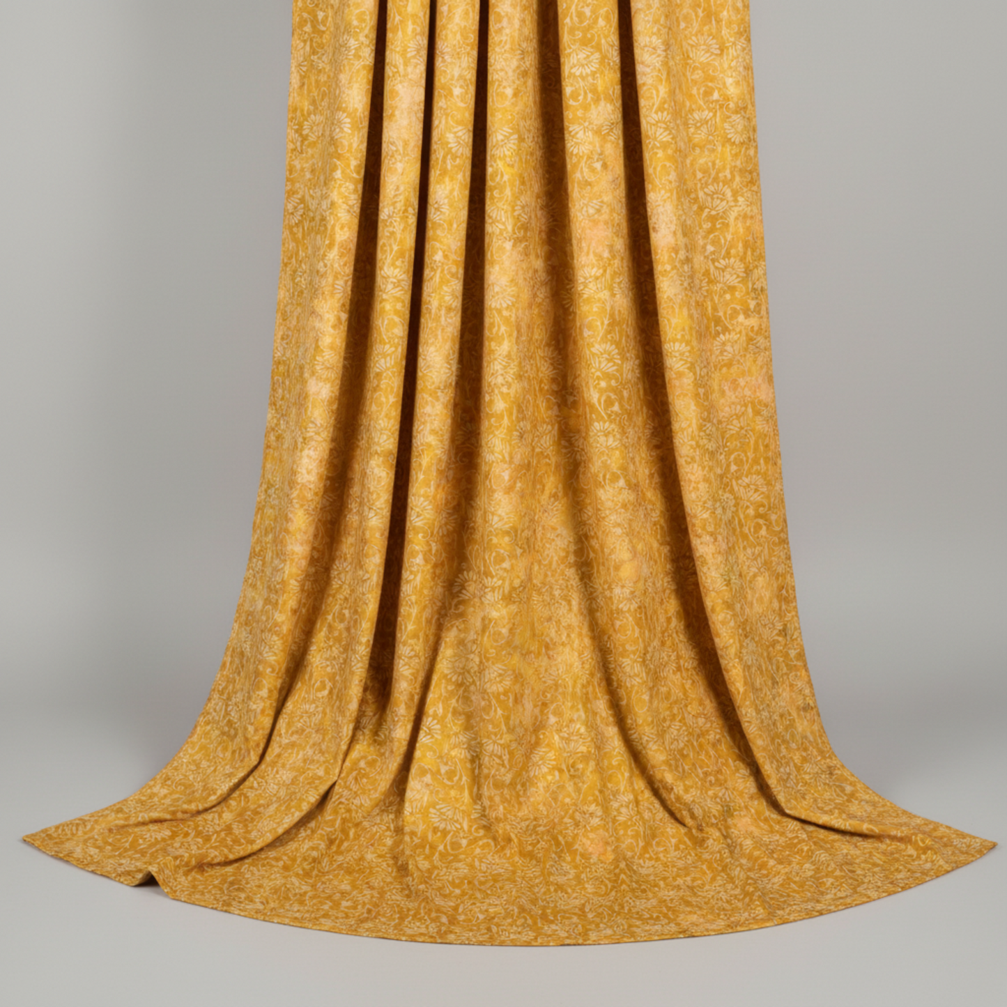 Prism II Yellow Blooms fabric with measuring tape showing scale of kaleidoscopic floral pattern - Jason Yenter premium quilting cotton 3 yard cut