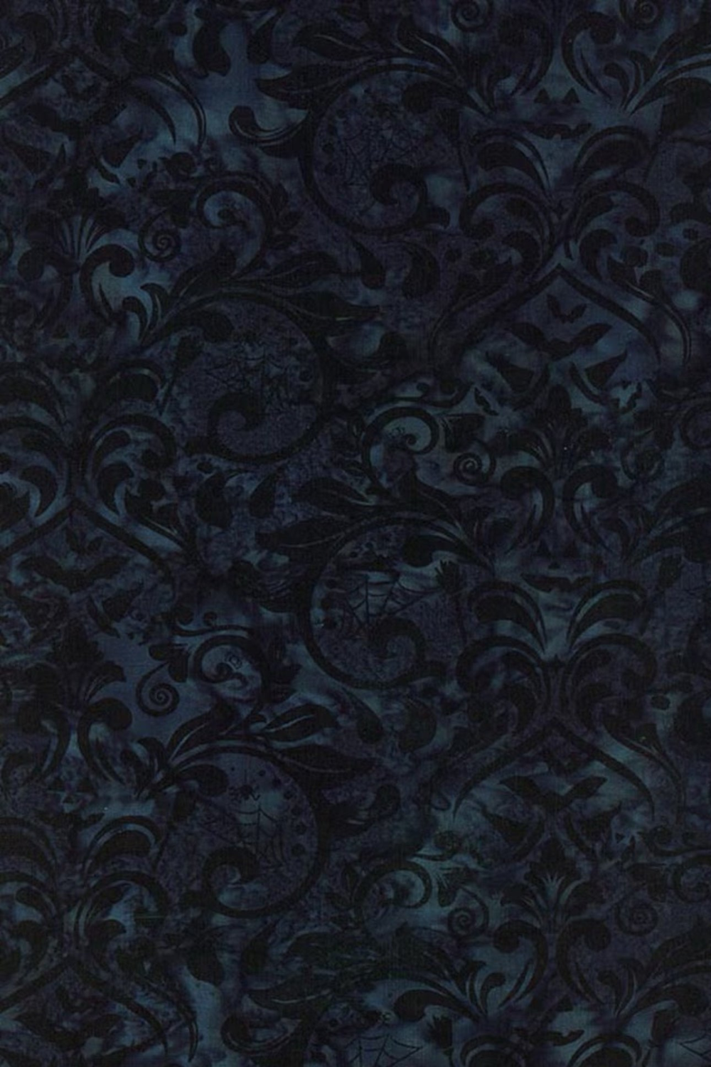 Close-up of Whispering Hollows Raven batik fabric by Riley Blake Designs, showing dark navy and black damask scrollwork with subtle teal-blue mottling.