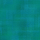 Vertical display of Interwoven Emerald quilting cotton showing continuous yardage and geometric pattern repeat