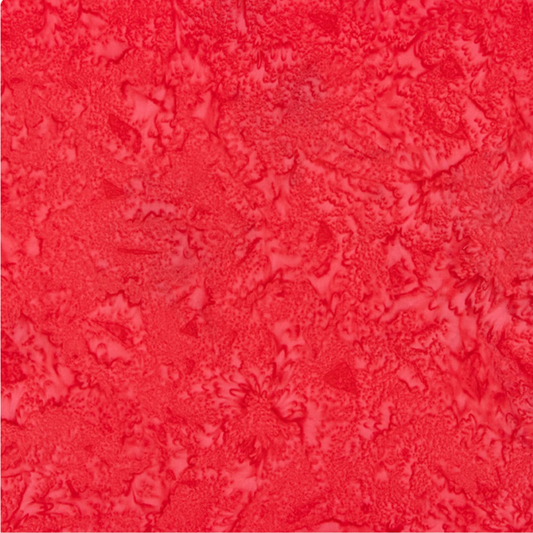 Close-up detail of Expressions Batiks Hand-Dyes Strawberry quilting cotton fabric highlighting print clarity and vibrant strawberry red tonal hand-dyed batik texture