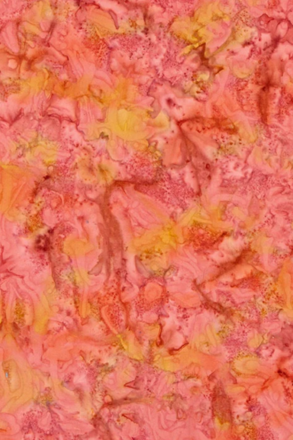 Expressions Batiks Hand-Dyes Sunset fabric by Riley Blake Designs – soft coral-pink hand-dyed batik with warm golden-orange splashes, soft peach tones, and hints of deeper rose, a luminous warm focal blender perfect for warm-toned, floral, and jewel-tone quilts, 100% cotton batik