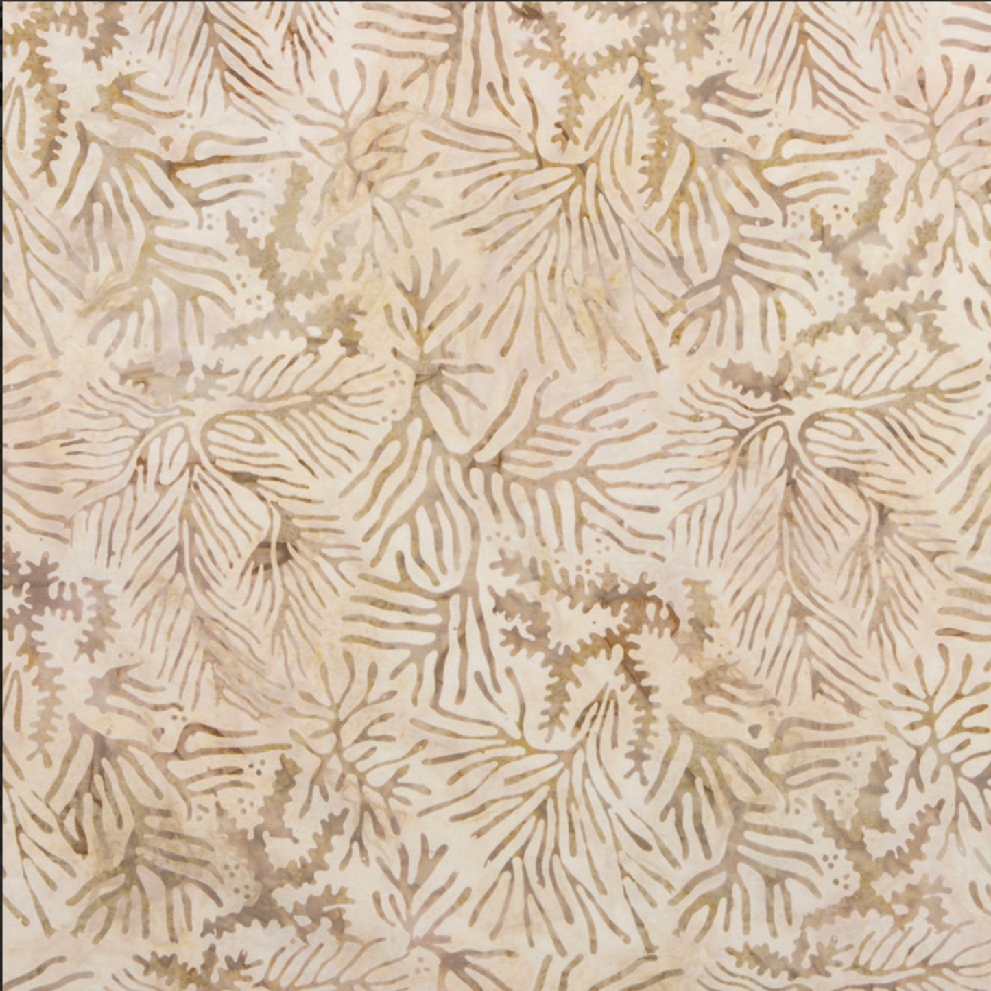 Close-up detail of Expressions Batiks Breathe Ecru quilting cotton fabric by Riley Blake Designs – warm cream and ecru tonal batik with all-over pine needle and feathery frond motif in soft taupe, warm tan, and golden-beige, low contrast organic texture