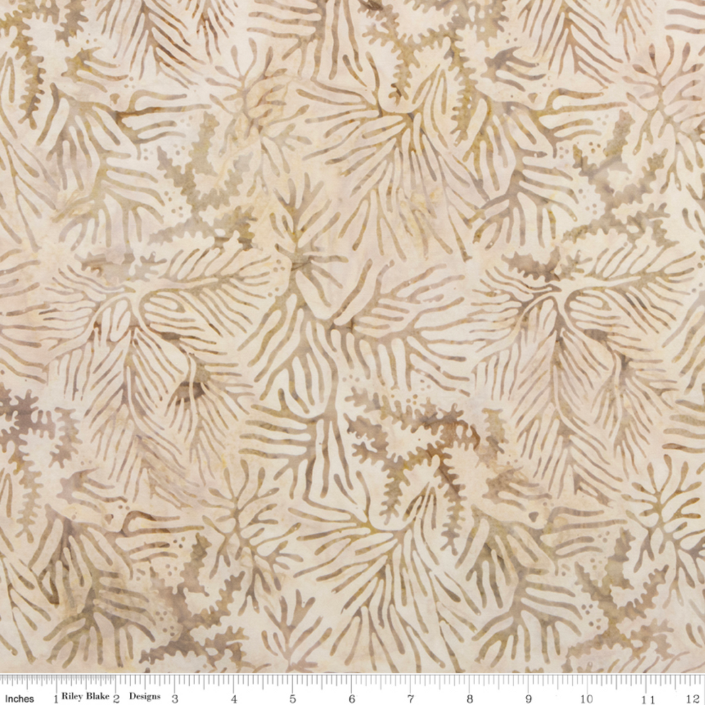 Expressions Batiks Breathe Ecru quilting cotton with Riley Blake Designs ruler showing scale of pattern repeat – warm cream and ecru tonal batik with all-over pine needle and feathery frond motif in soft taupe and golden-beige, pattern repeat approximately 4–5 inches