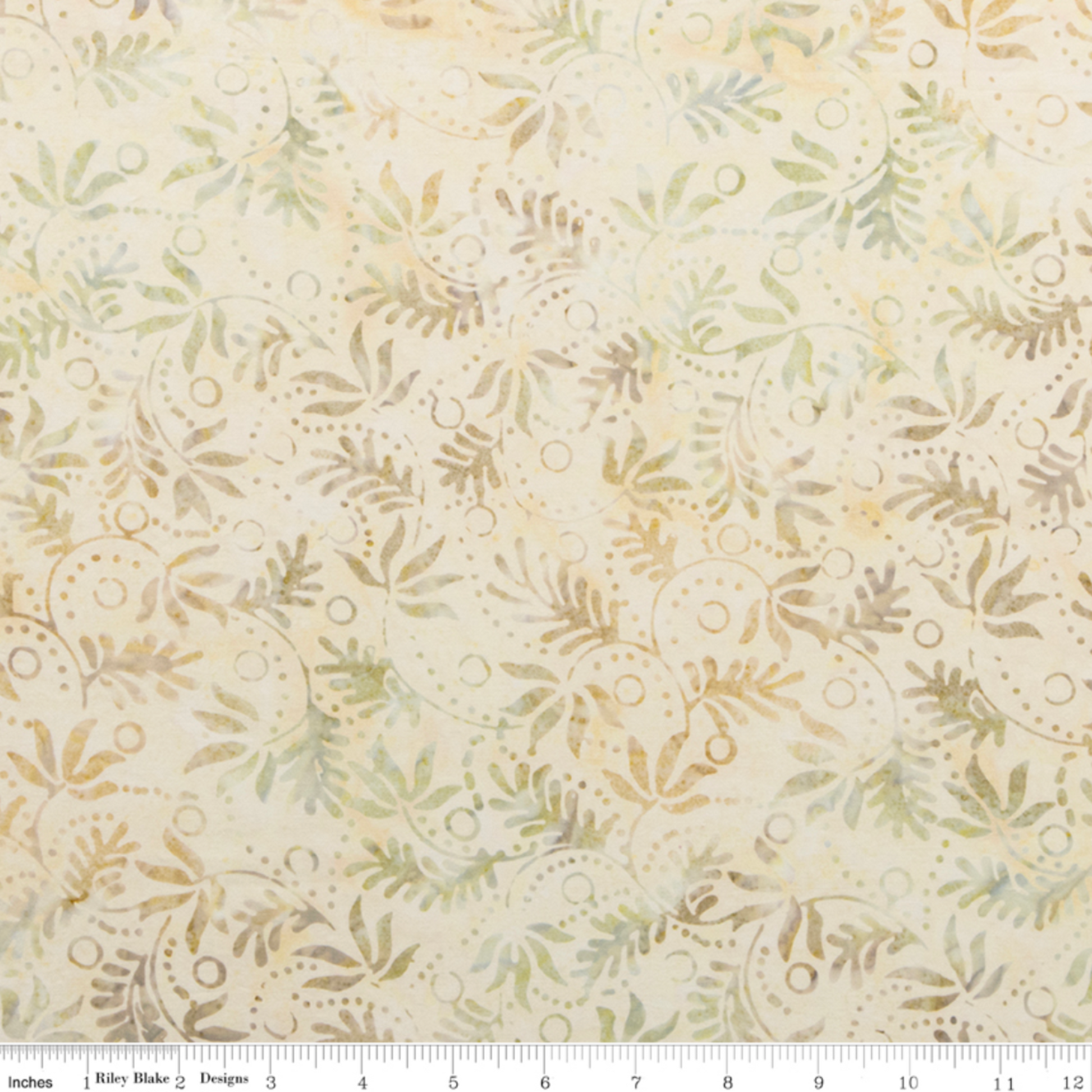 Expressions Batiks Breathe Laurel quilting cotton with Riley Blake Designs ruler showing scale of pattern repeat – cream and ivory tonal batik with feathery fronds, dotted circular swirl outlines, and tiny leaf sprigs in soft sage green and warm taupe, pattern repeat approximately 4–5 inches