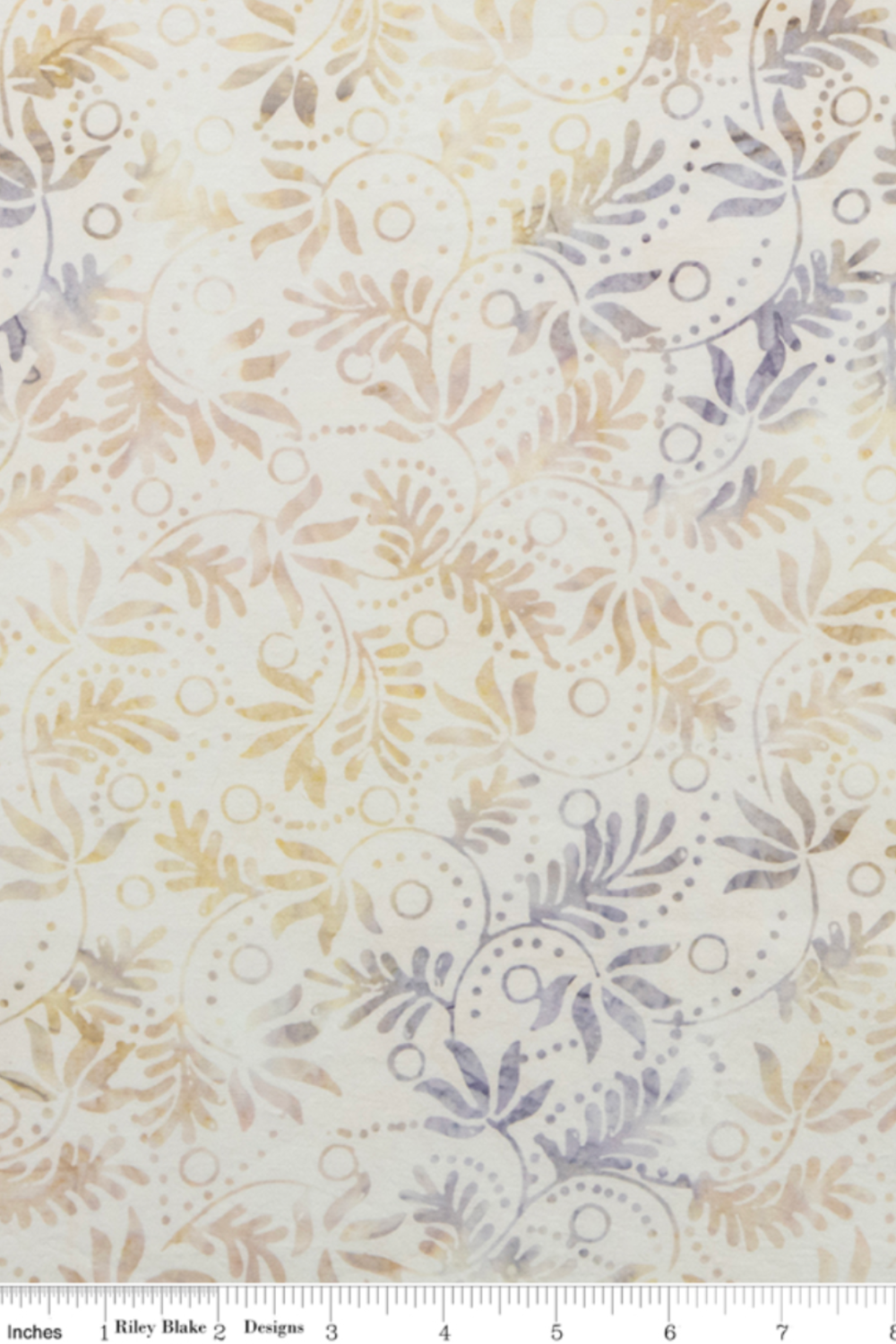 Expressions Batiks Breathe Flaxen by Riley Blake Designs – Pinterest scale reference showing full pattern repeat of swirling vine, feathery leaf sprigs, and dotted circles in warm gold, tan, and lavender-grey on cream ground, Riley Blake ruler at bottom