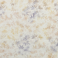 Expressions Batiks Breathe Flaxen by Riley Blake Designs – close-up detail of cream and ivory tonal batik with all-over swirling vine, feathery leaf sprigs, and dotted circle motifs in soft warm gold, tan, and lavender-grey