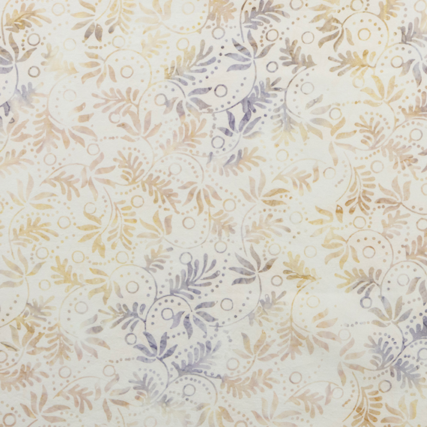 Expressions Batiks Breathe Flaxen by Riley Blake Designs – close-up detail of cream and ivory tonal batik with all-over swirling vine, feathery leaf sprigs, and dotted circle motifs in soft warm gold, tan, and lavender-grey