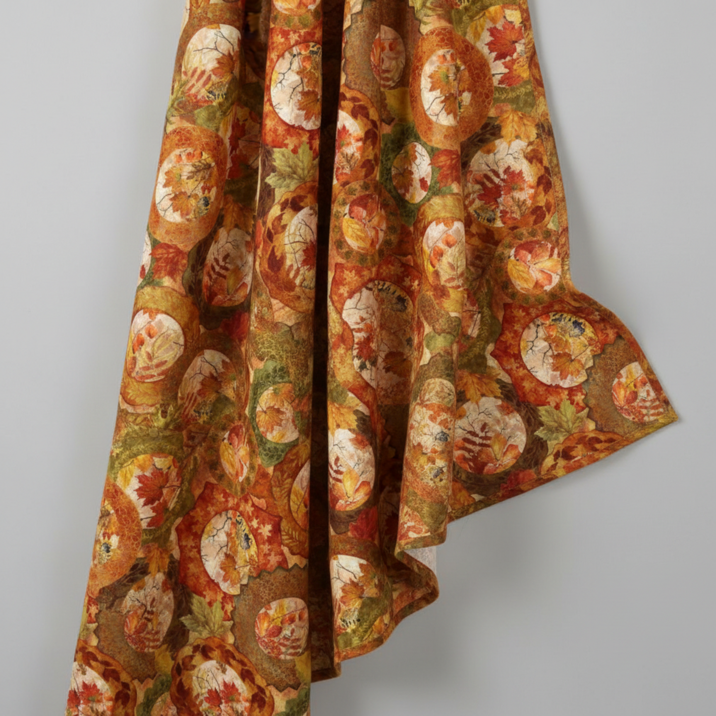 Autumn Celebration Multi Circles fabric draped to show natural fall and movement of 100% cotton material