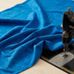 Expressions Batiks Hand-Dyed Imperial – fabric with soft folds near vintage sewing machine in quilting room, Riley Blake Designs