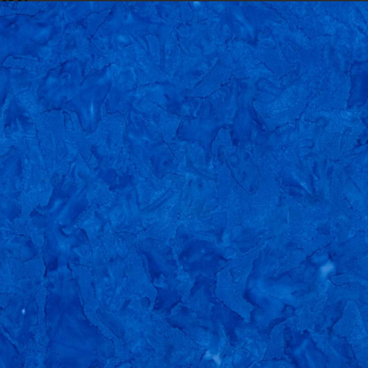 Close-up detail of Expressions Batiks Hand-Dyed Cobalt quilting cotton fabric highlighting print clarity and texture
