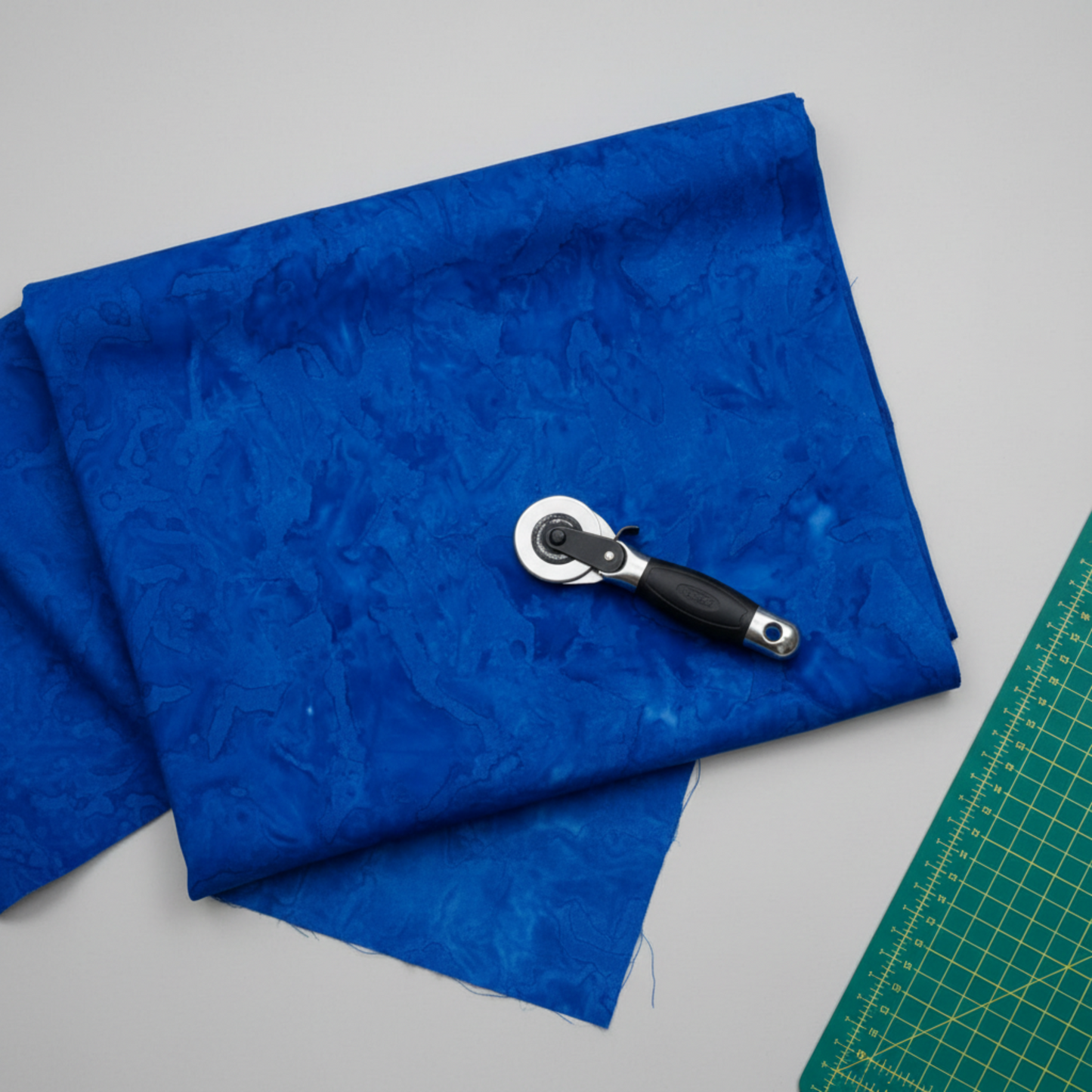Expressions Batiks Hand-Dyed Cobalt quilting cotton styled for quilting project inspiration