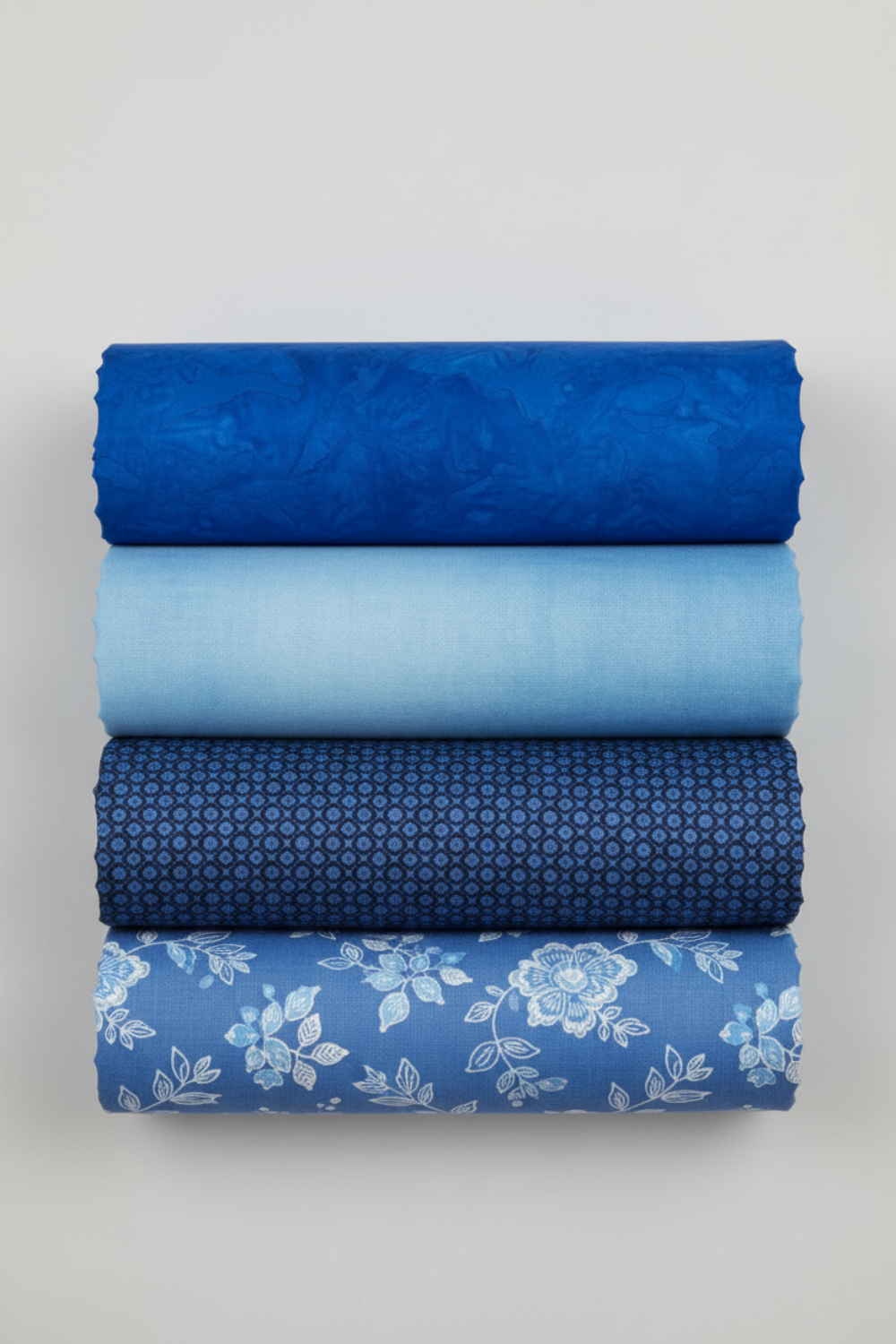 Expressions Batiks Hand-Dyed Cobalt – Pinterest coordination stack with 4 complementary fabrics stacked vertically on light grey background