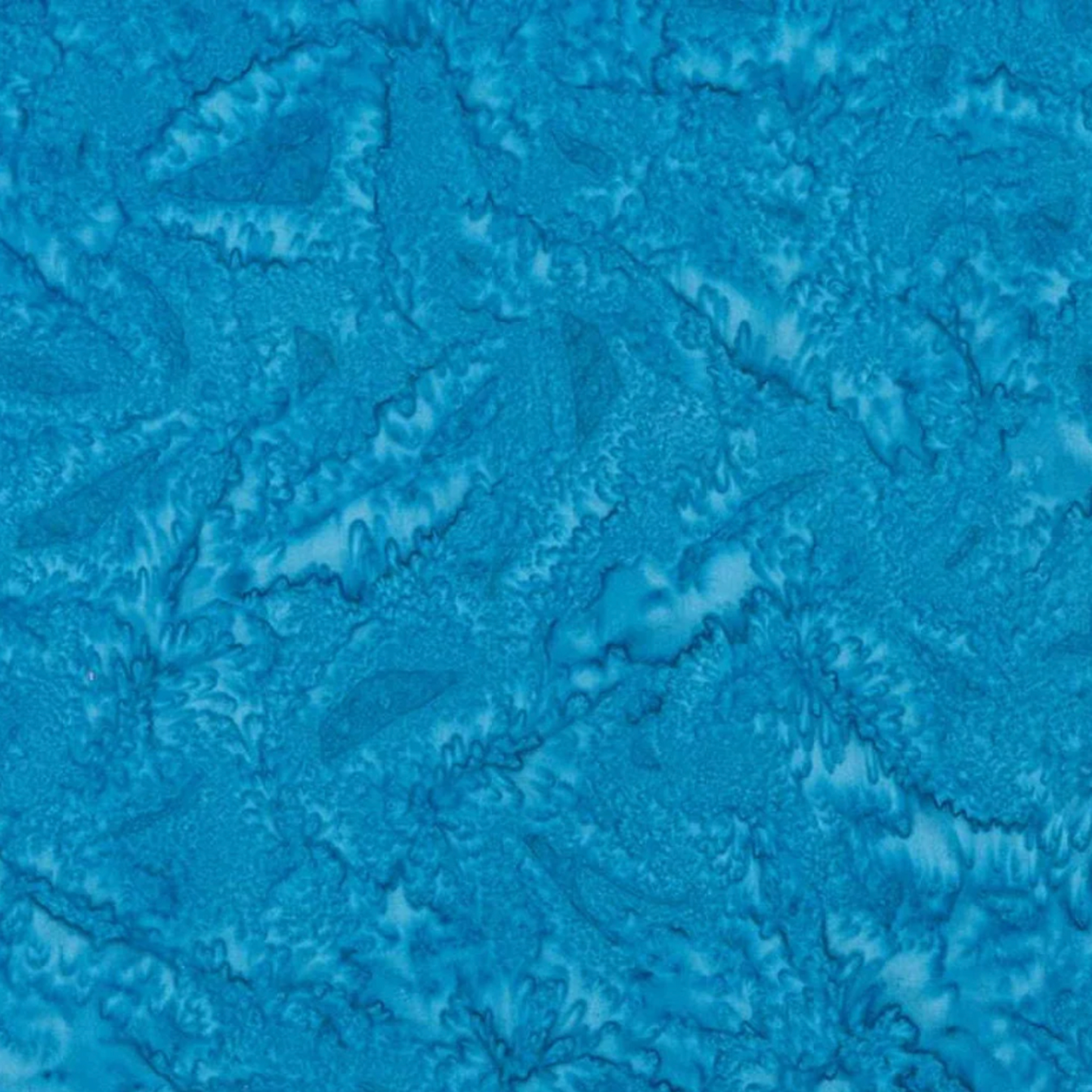 Close-up of Expressions Batiks Hand-Dyes Hand-Dyed Ocean Blue quilting cotton fabric by Riley Blake Designs showing hand-dyed tonal texture and subtle batik surface detail
