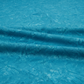 Expressions Batiks Hand-Dyes Hand-Dyed Ocean Blue quilting cotton fabric by Riley Blake Designs – ocean blue batik arranged in soft folds on flat surface to show drape and texture