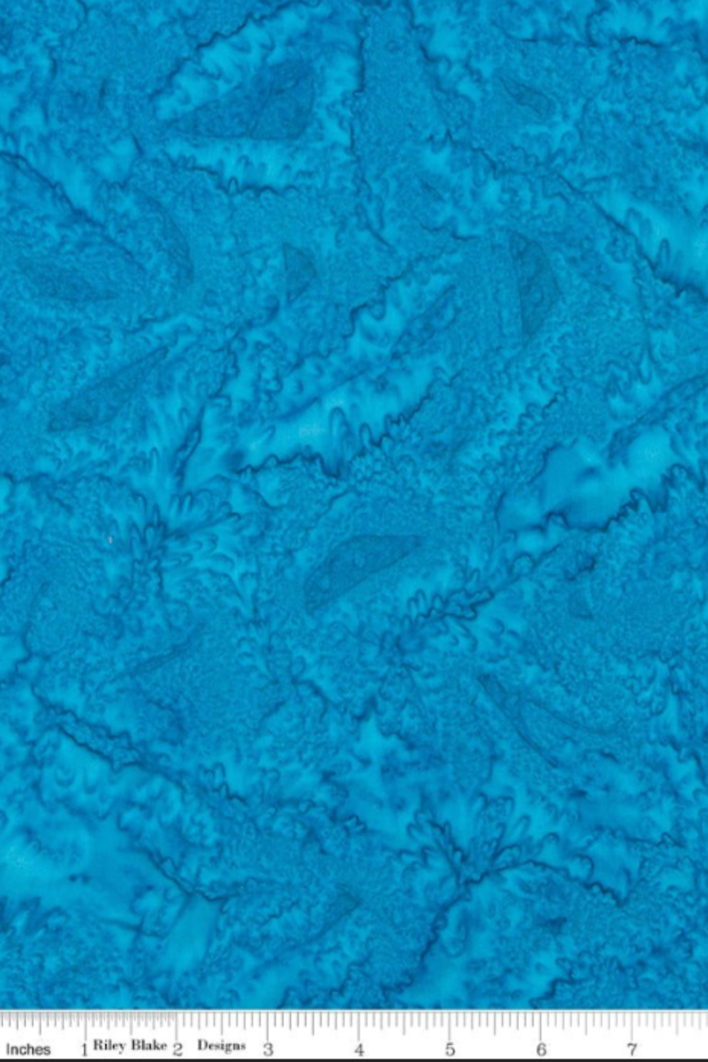 ocean blue hand-dyed batik quilting cotton from Expressions Batiks Hand-Dyes by Riley Blake Designs shown with scale reference for quilting projects