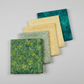 Expressions Batiks Hand-Dyes quilting cotton fabrics including Amazon – 5 coordinating fabrics in complementary colors slightly fanned on light grey background