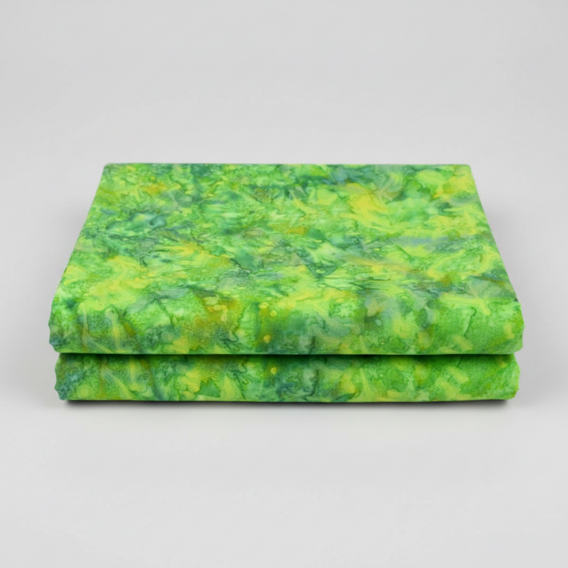 Expressions Batiks Hand-Dyed Shamrock quilting cotton fabric by Riley Blake Designs – premium 100% cotton showing bright shamrock green organic tonal variation and hand-dyed texture
